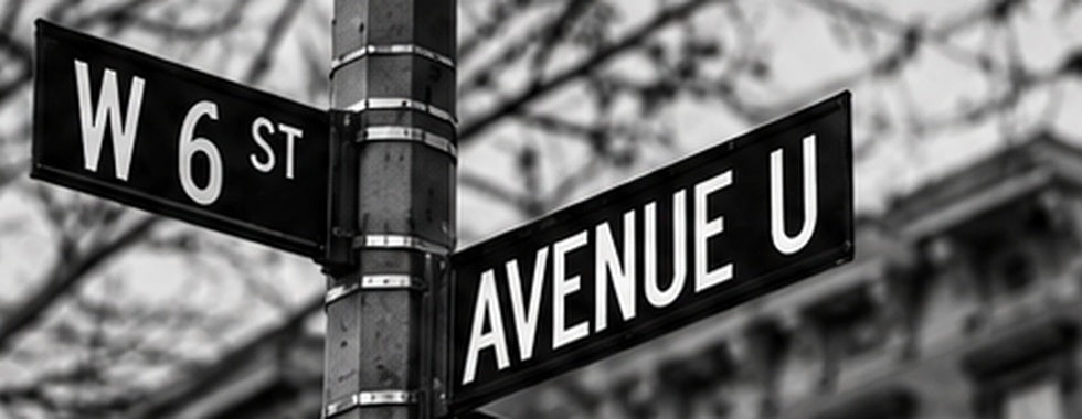 West 6th Street and Avenue U street signs in Gravesend, Brooklyn